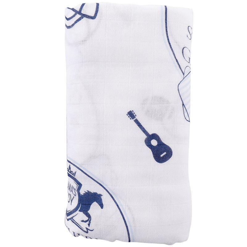 The Southern Gentleman muslin swaddle blanket rolled to show its guitar and hound dog print.