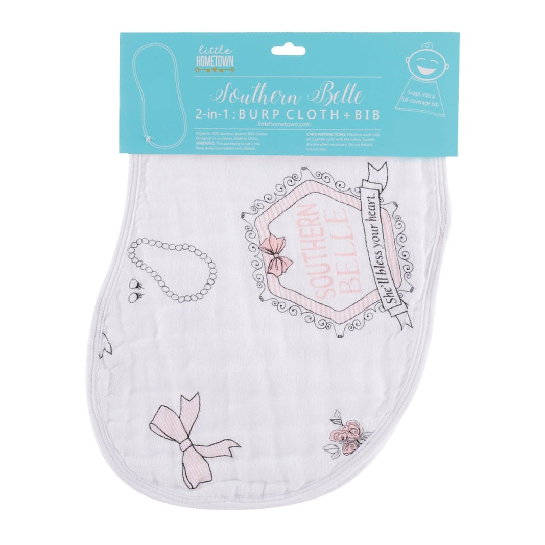 The Southern Belle burp cloth and bib combo, curved gently beside its printed packaging label.