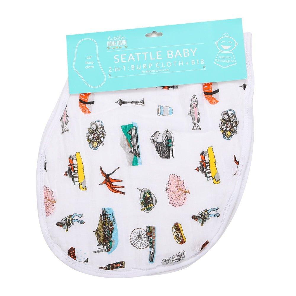 The Seattle burp cloth and bib combo from Washington, packaged with the Space Needle and salmon.