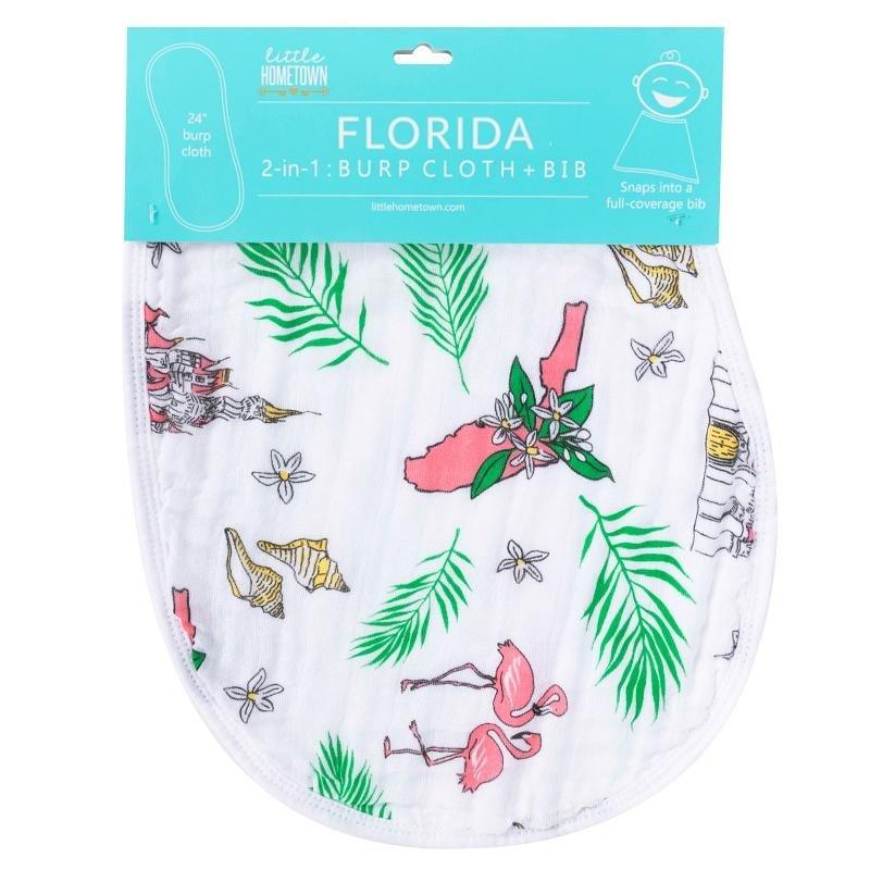 Baby burp cloth and wraparound bib with vibrant Florida floral pattern, featuring pink, yellow, and green hues.