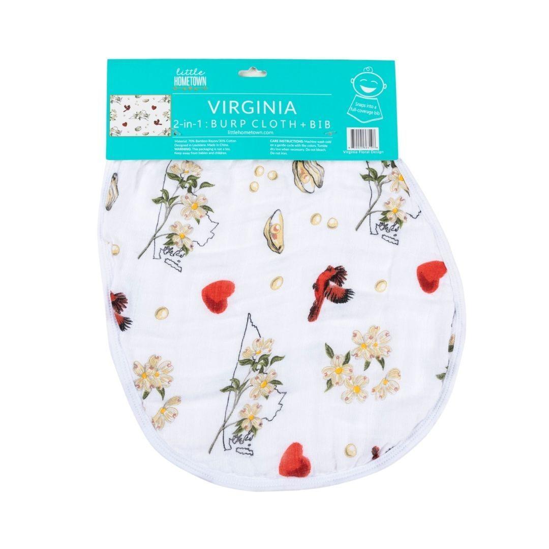 The Virginia Floral burp cloth and bib combo with dogwood blooms and cardinals, beside its header card.
