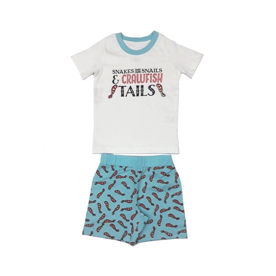 Boys' pajamas with playful crawfish tail pattern in red and blue, set against a white background.