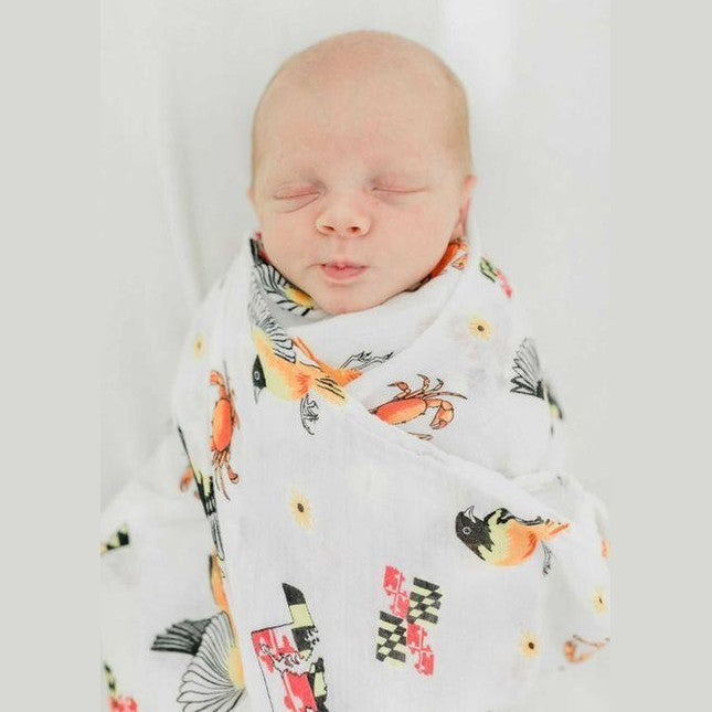 Maryland-themed baby gift set with muslin swaddle blanket and burp cloth/bib combo, featuring state icons.