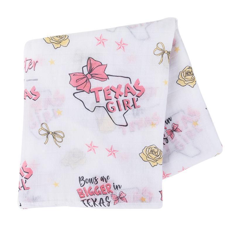 Texas-themed baby girl gift set with a muslin swaddle blanket and burp cloth, featuring pink and white designs.