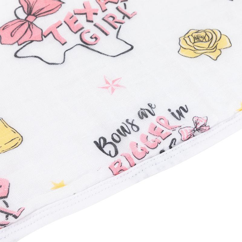 Texas-themed baby girl gift set with a muslin swaddle blanket and burp cloth/bib combo, featuring pink and white designs.