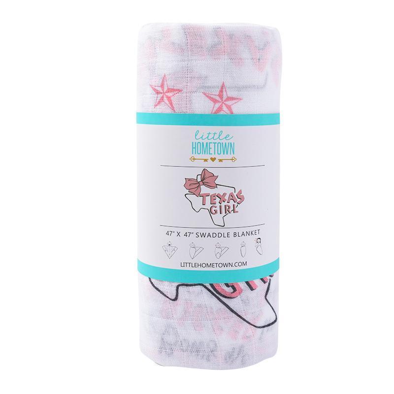 Texas-themed baby girl gift set with a muslin swaddle blanket and burp cloth/bib combo, featuring pink and white designs.