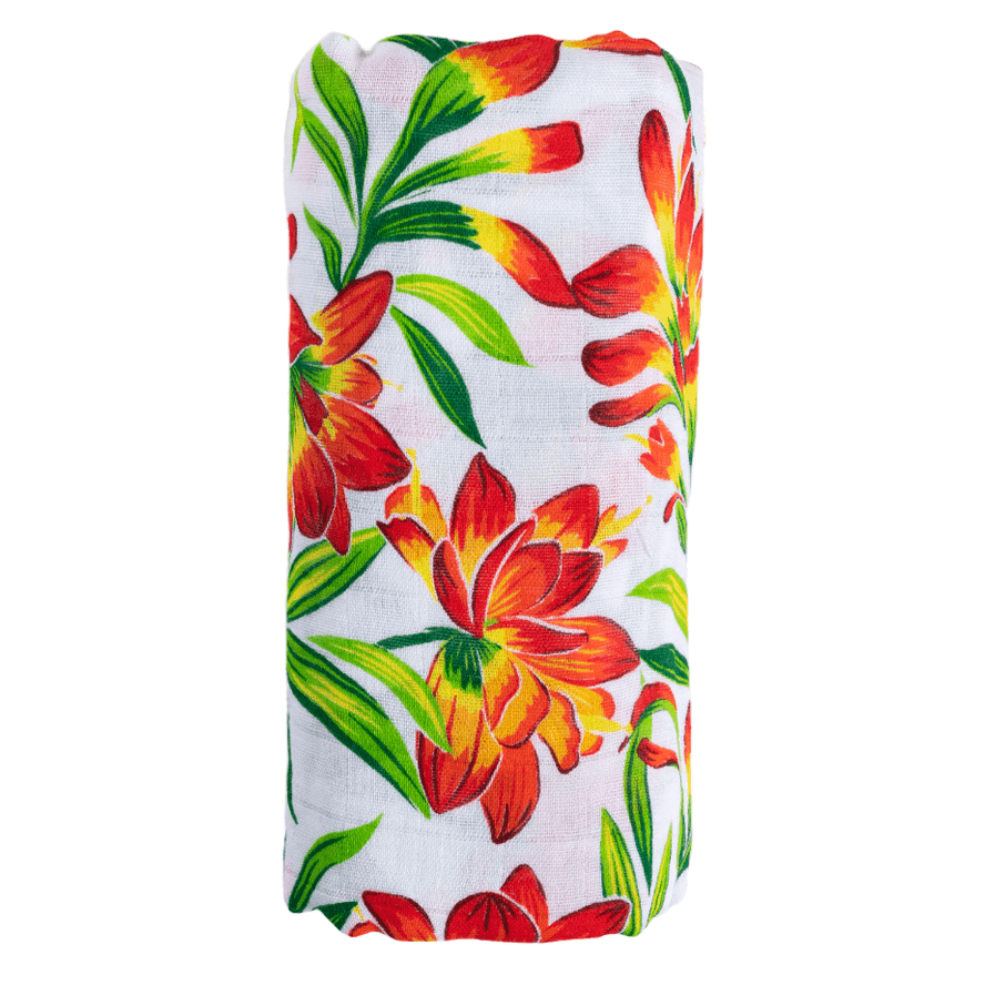 Prairie Fire baby muslin swaddle blanket and burp cloth set with vibrant floral design on a white background.