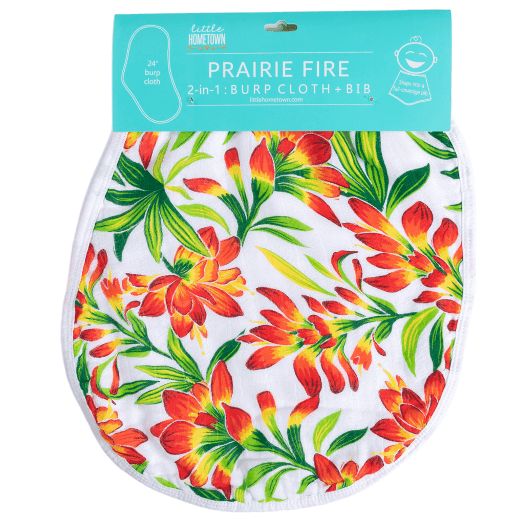 Prairie Fire baby muslin swaddle blanket and burp cloth set with vibrant floral design on a white background.