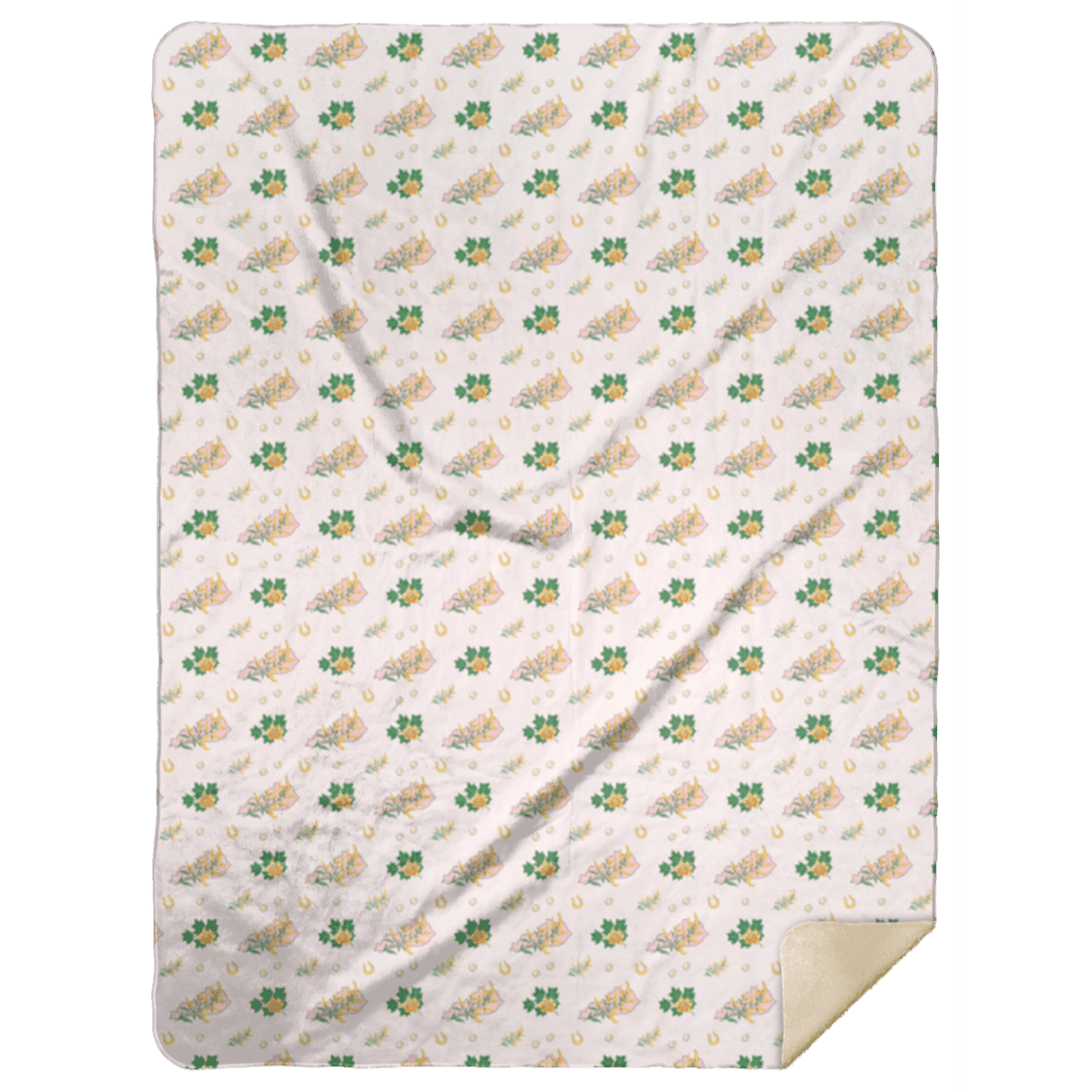 The Kentucky floral plush throw blanket folded neatly against a deep green studio backdrop.