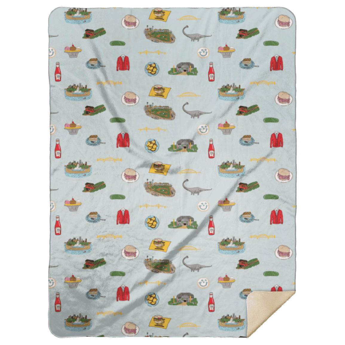 The Pittsburgh plush throw blanket folded up, printed with picnic scenes from around the city.