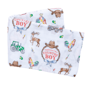 Country Boy baby gift set with swaddle blanket and burp bib, featuring a cute farm animal print.