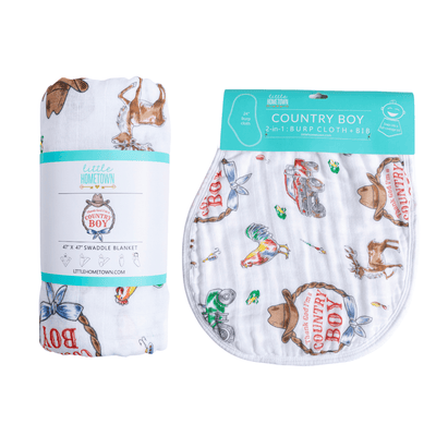 A rolled Country Boy swaddle beside its matching burp cloth and bib combo, ready for a coming home day.