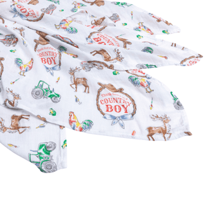 Country Boy baby gift set with a swaddle blanket and burp bib, featuring a cute farm animal print.