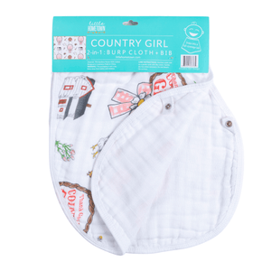 Country girl baby gift set with floral swaddle blanket and matching burp bib, featuring pink and green accents.