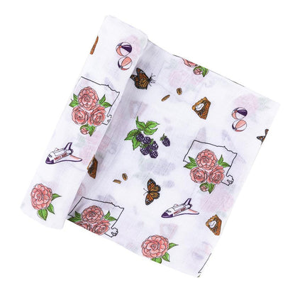 Alabama-themed floral baby muslin swaddle blanket and burp cloth set, featuring delicate pink and green patterns.