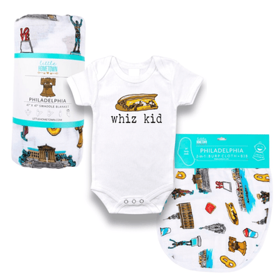 The Philadelphia Whiz Kid gift bundle with a cheesesteak onesie, a rolled muslin swaddle blanket and a burp cloth.