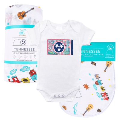 The Tennessee Flag baby gift set with a rolled swaddle, flag onesie and matching little bib.
