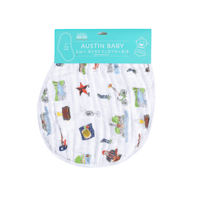 Baby bib and burp cloth set with "Austin" text, featuring Texas icons like guitars and cowboy boots in pastel colors.