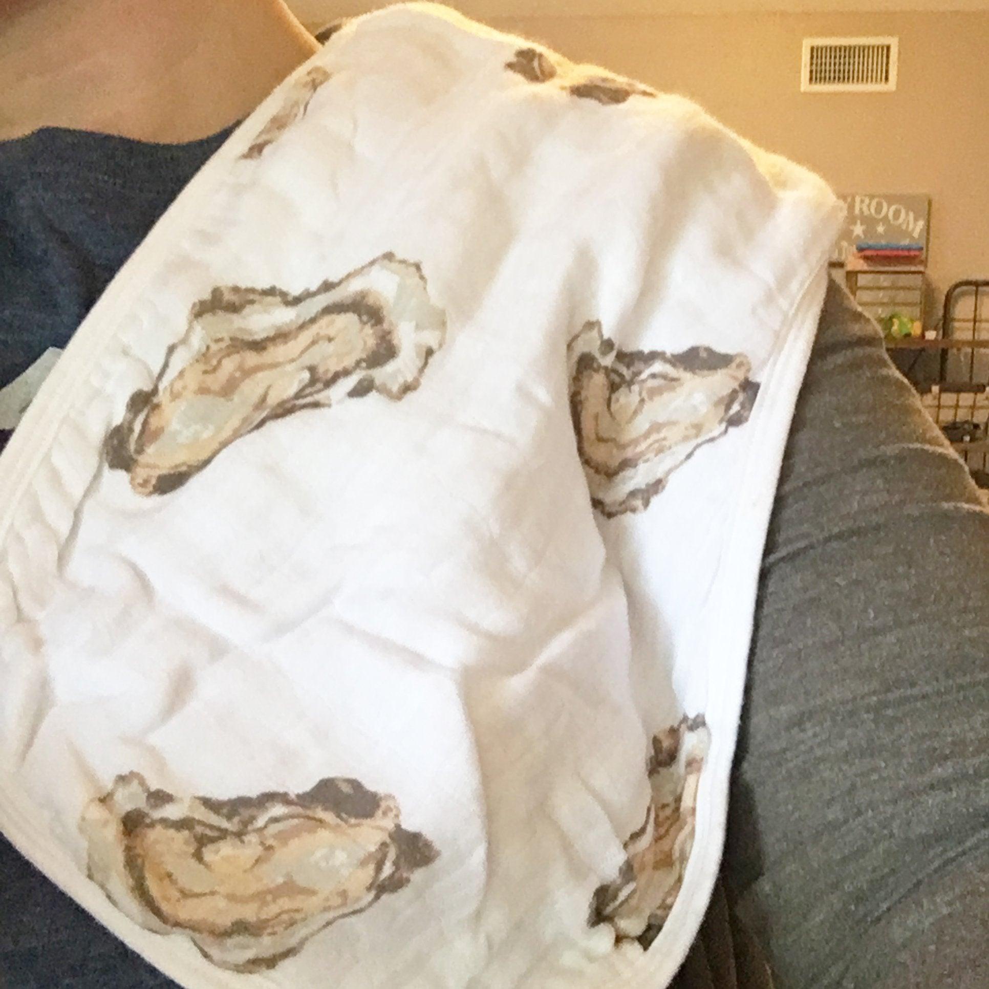 Baby bib and burp cloth set with cute oyster design and "Aw Shucks" text on a white background.