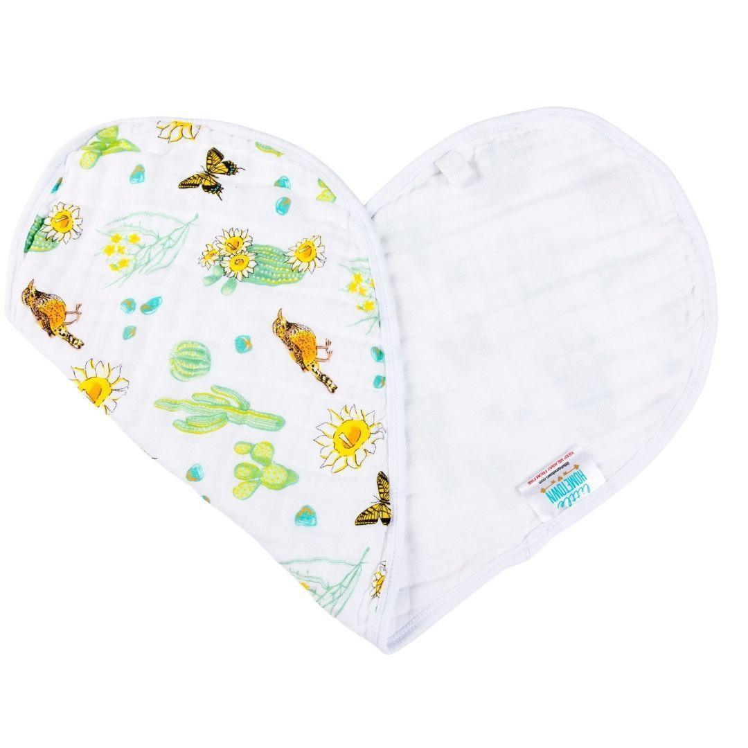 Baby burp cloth and bib set with colorful cactus blossom design on a white background, by Little Hometown.