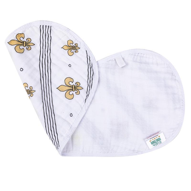 White baby bib and burp cloth set with blue fleur-de-lis pattern, neatly folded on a white background.