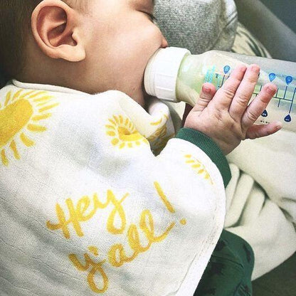 White baby bib and burp cloth set with "Hey Y'all" text in playful blue font, perfect for a Southern-themed gift.