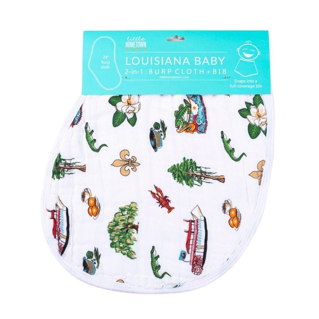 White baby bib and burp cloth set with "Louisiana Baby" text and state outline, featuring playful icons.