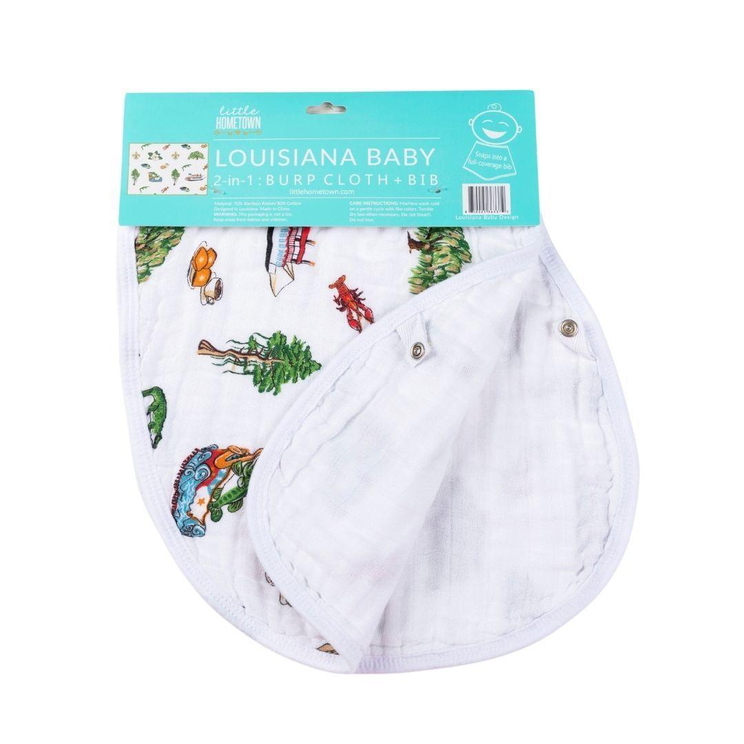 White baby bib and burp cloth set with "Louisiana Baby" text and state outline, featuring playful icons.