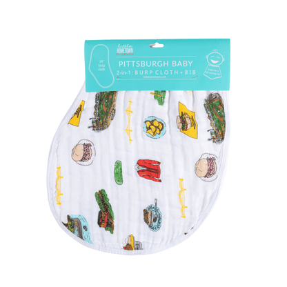 Baby bib and burp cloth set with Pittsburgh skyline design, featuring iconic buildings in soft pastel colors.