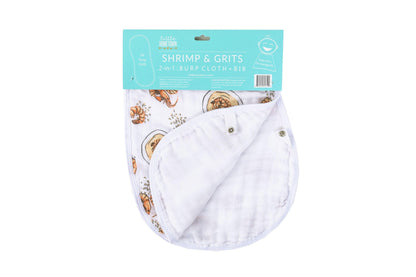 Baby bib and burp cloth set with playful shrimp and grits pattern, featuring pastel colors and soft fabric.