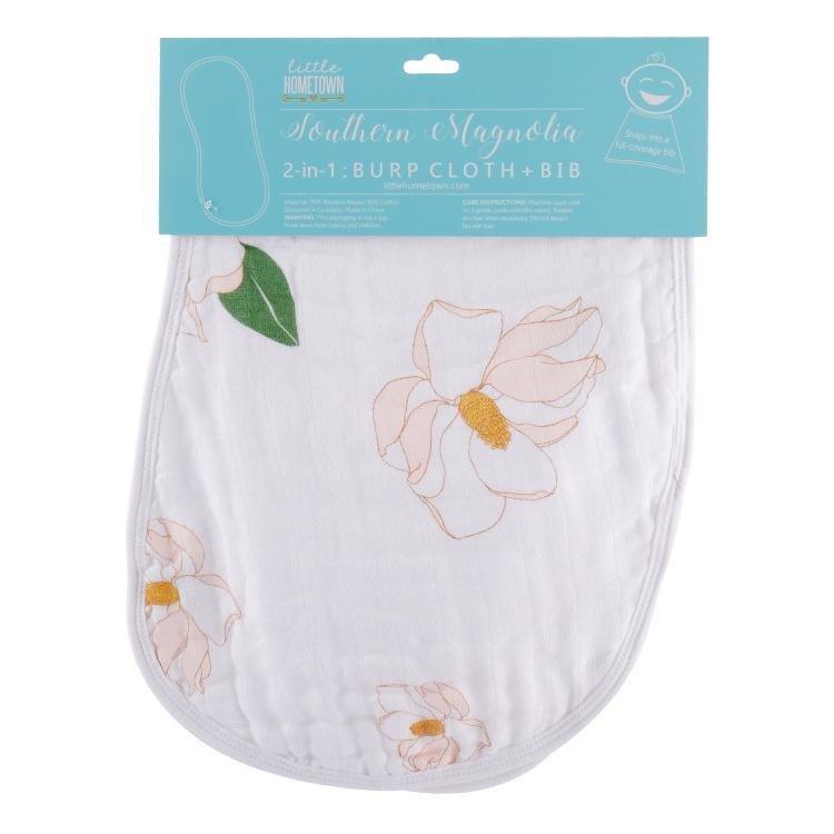 Baby bib and burp cloth set with Southern Magnolia print, featuring delicate white flowers on a soft pastel background.