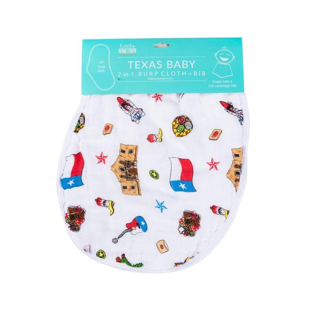 White baby bib and burp cloth set with "Texas Baby" text and state outline, featuring blue and red accents.