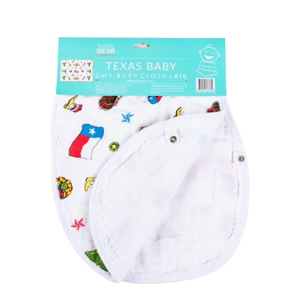 White baby bib and burp cloth set with "Texas Baby" text and state outline, featuring blue and red accents.