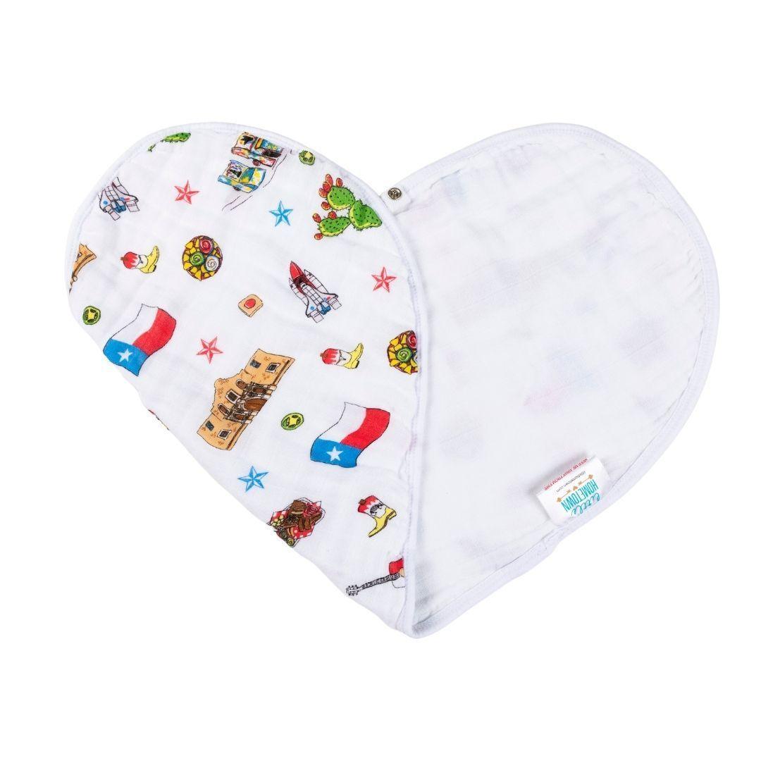 Baby bib and burp cloth set with Texas-themed designs, featuring state icons and "Texas Baby" text in blue.