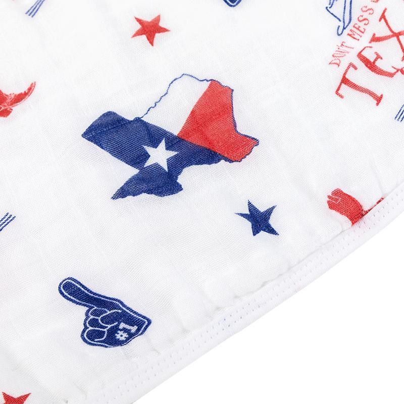 Texas-themed baby bib and burp cloth set with "Texas Boy" text, featuring blue and white patterns and a star.