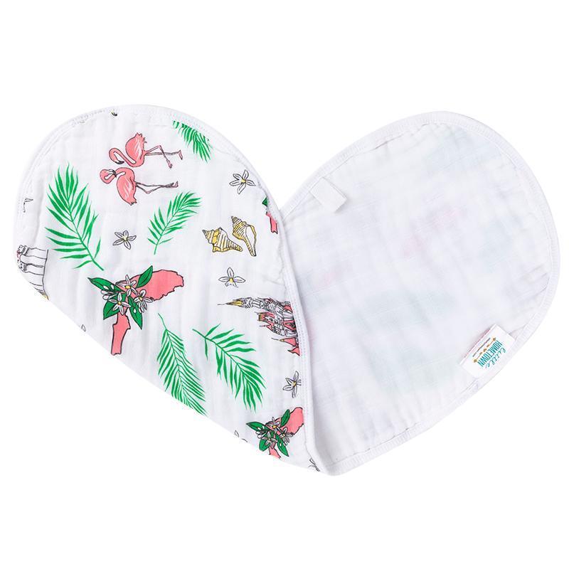 Baby burp cloth and wraparound bib with vibrant Florida floral pattern, featuring pink, yellow, and green hues.