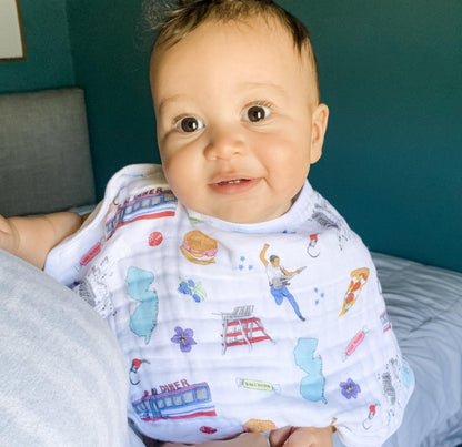 Baby burp cloth and wraparound bib set featuring a New Jersey map design, displayed on a white background.