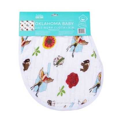 Baby burp cloth and wraparound bib set featuring "Oklahoma Baby" text and state-themed illustrations in soft pastels.