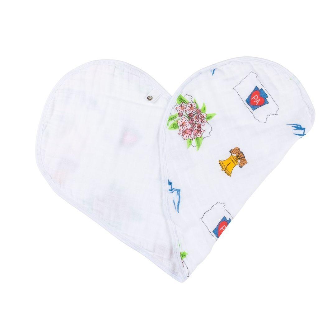 Baby burp cloth and wraparound bib set featuring a Pennsylvania map design with landmarks and icons in pastel colors.