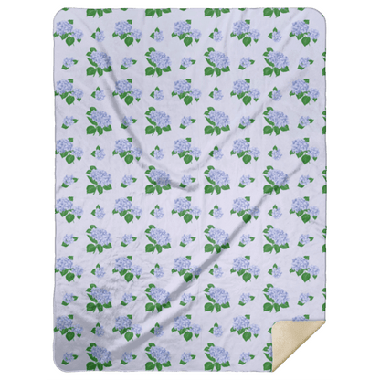Soft blue hydrangea plush throw blanket, 60x80 inches, featuring delicate floral patterns on a cozy fabric.