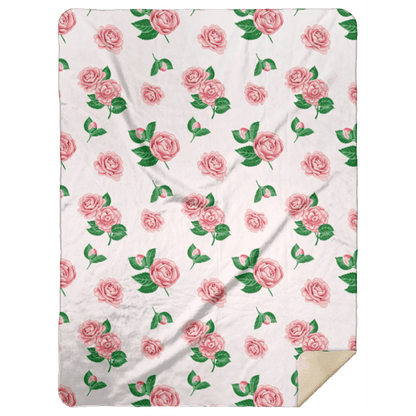 Soft, plush throw blanket with a delicate camellia flower pattern in pastel colors, measuring 60x80 inches.