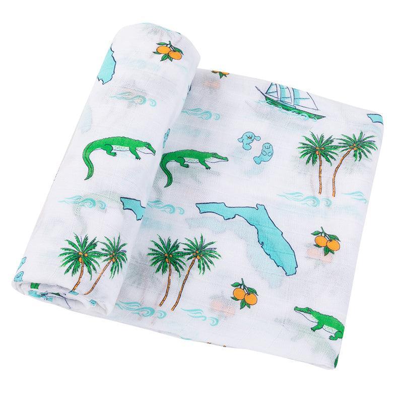 Baby swaddle blanket with Florida map design, featuring landmarks, beaches, and vibrant colors on soft muslin.