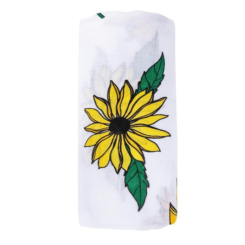 Black-eyed Susan muslin swaddle and burp cloth set with vibrant yellow flowers on a white background.