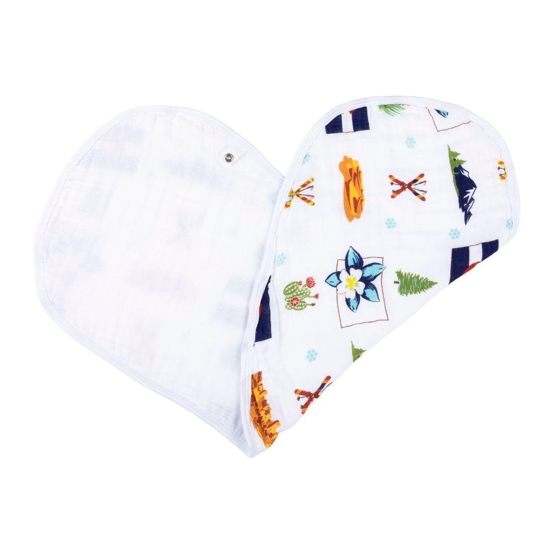 Colorado-themed baby gift set with muslin swaddle blanket and burp cloth/bib combo, featuring mountain designs.
