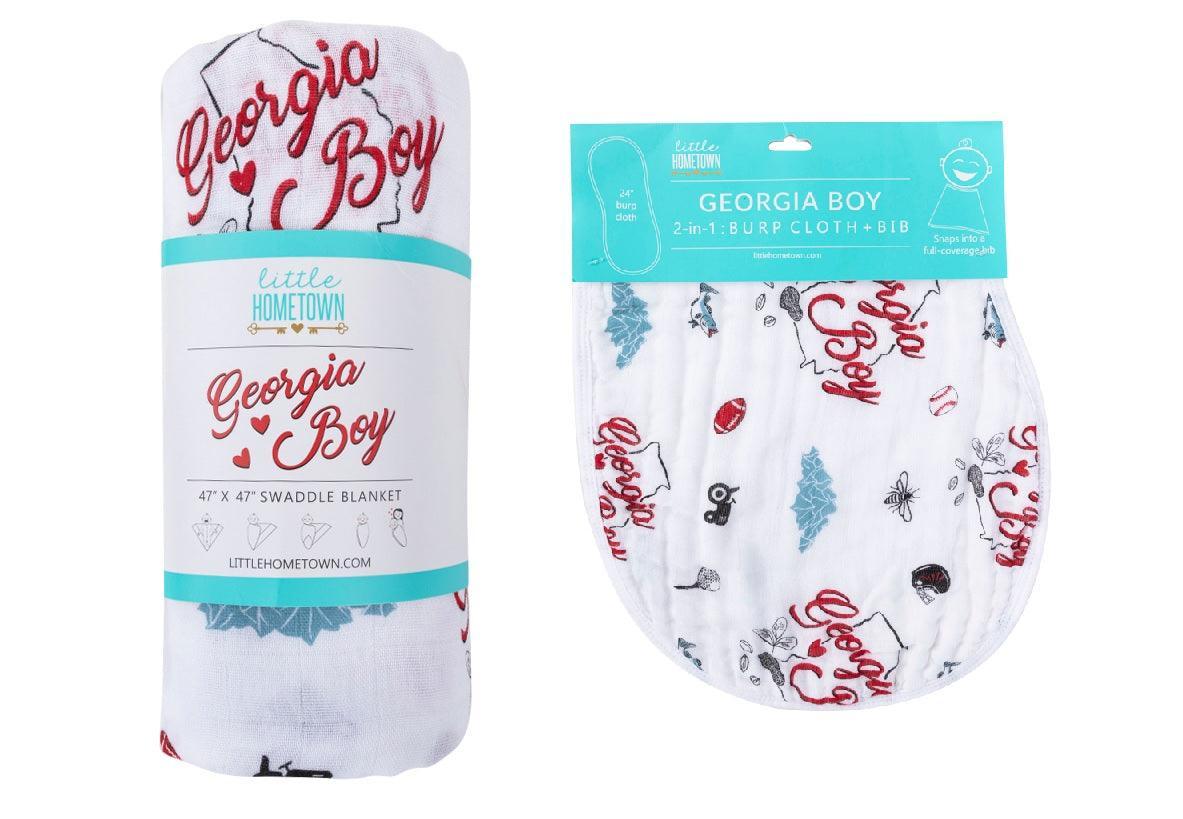 Gift set with Georgia Boy muslin swaddle blanket and burp cloth/bib combo, featuring state-themed designs.