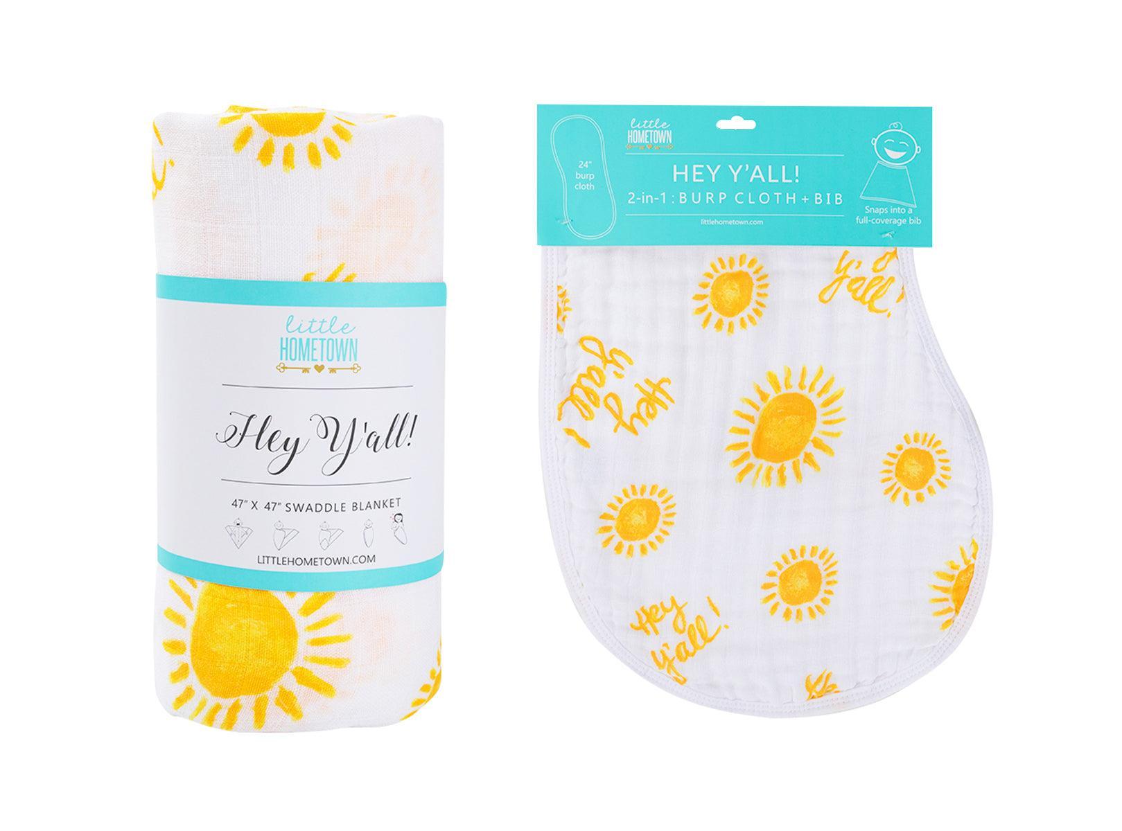 Gift set with "Hey Y'all" muslin swaddle blanket and burp cloth/bib combo in soft pastel colors.