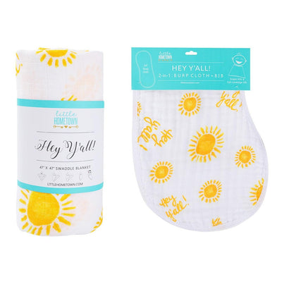 Gift set with "Hey Y'all" muslin swaddle blanket and burp cloth/bib combo in soft pastel colors.
