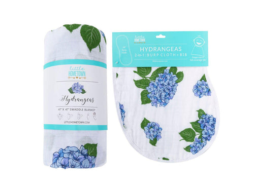 Hydrangea-themed baby muslin swaddle blanket and burp cloth set, featuring soft pastel colors and floral patterns.