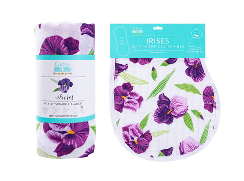 Gift set with baby muslin swaddle blanket and burp cloth, featuring vibrant iris flower patterns.