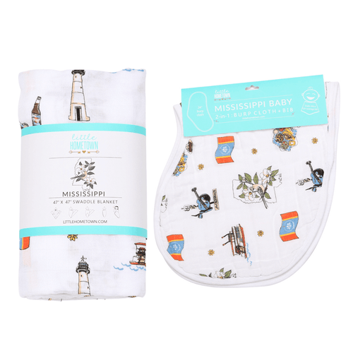 Mississippi-themed muslin swaddle and burp cloth set featuring state icons like magnolias, guitars, and riverboats.